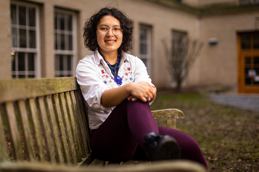 photo of Amelia Dogan on a bench